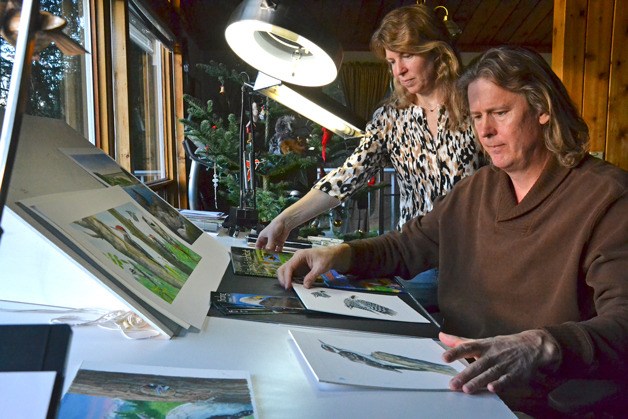 Joy and Craig Johnson have spent countless hours bird-watching from their deck in Freeland. In their new book