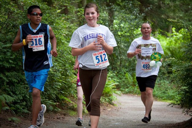 Naomi Bartel winds through the trails during the Chum Run. The Langley resident is trailed by Kyle Chambers