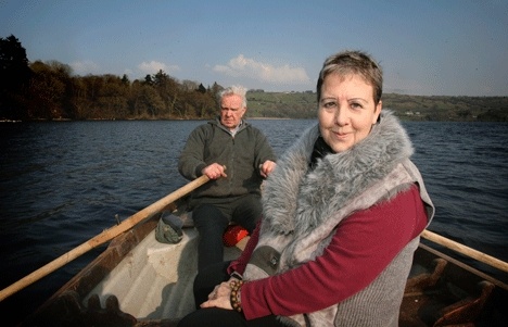 Port Angeles poet Tess Gallagher and Irish painter Josie Gray enjoy a few strokes around Gray’s hometown lake