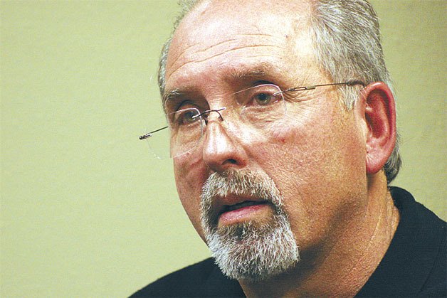 Larry Kwarsick answers questions for the Langley City Council during the council's meeting on Monday. Kwarsick will serve as the head of Langley's planning department under a consultant contract approved by the council.