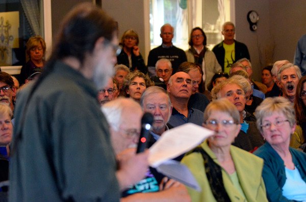 Steve Erickson of Whidbey Environmental Action Network addresses a crowd at a Tuesday meeting concerning plans for  three state park properties.