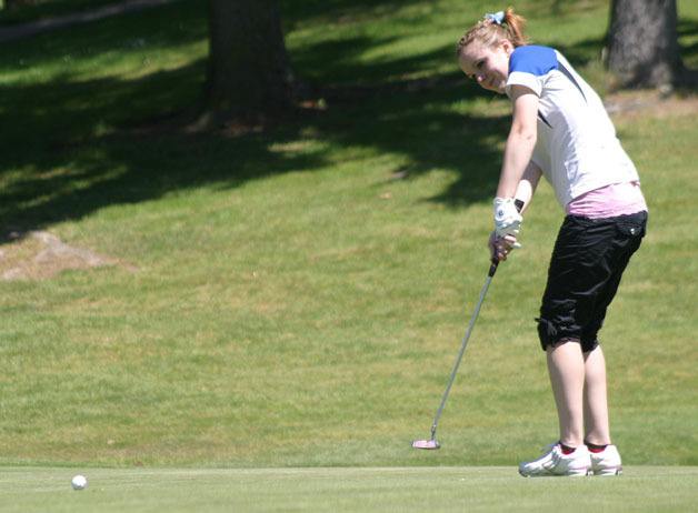 Jenna Kaik tracks her first putt on the first hole of the first round at the Snohomish Golf Course. The Falcon junior finished seventh overall at the District 1 girls golf tournament May 14-15.