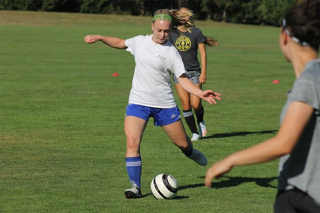 South Whidbey senior Carmen Colar prepares to pass during a recent practice.