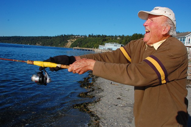Clinton resident Don Hoffler casts for coho at Bush Point on South Whidbey Monday. Fishing season is now in full swing and the experts are reporting a good year.