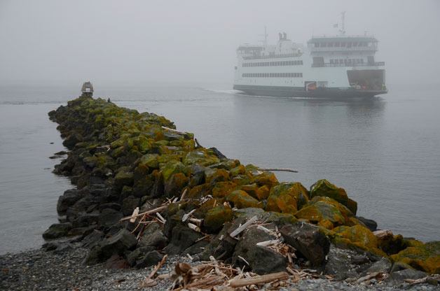 The M/V Kennewick sails through morning fog into Keystone Harbor. A recent meeting with ferry officials and legislators resulted in several changes for the new boats.