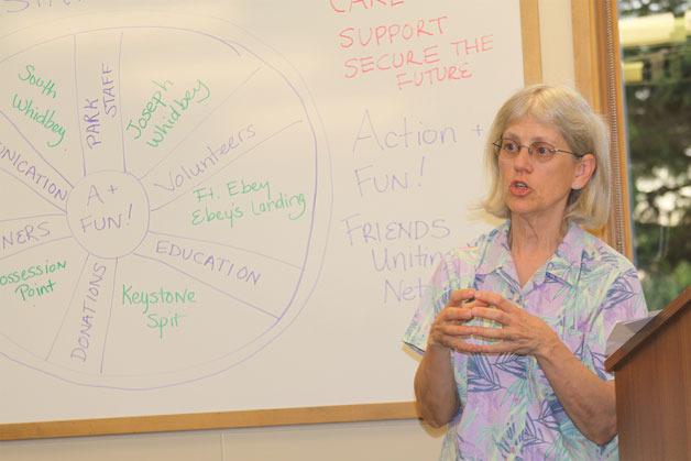 Margie Parker talks about how a new state parks friends group is coming together Tuesday night at the Coupeville Library.