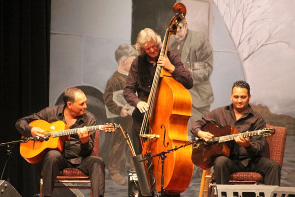 Band of Brothers Stochelo and Mozes Rosenberg perform with bassist Simon Planting at DjangoFest Northwest 2014 at the Langley Middle School auditorium