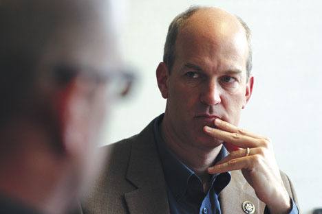 U.S. Rep. Rick Larsen listens during a roundtable discussion with community leaders in Langley this week.