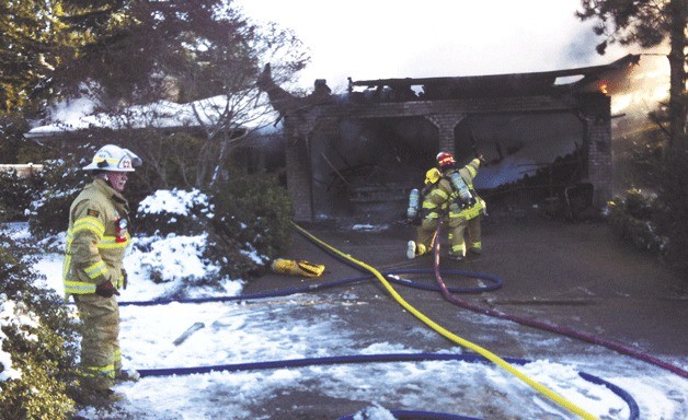 Firefighters put out a house fire near Bayview on Tuesday that left an elderly woman homeless.