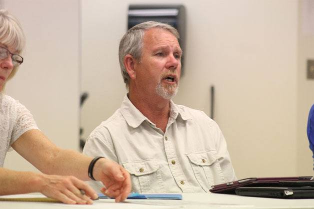 South Whidbey School District Assistant Superintendent of Business Dan Poolman presented the $20.7 million budget at a public hearing Wednesday night.