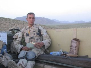 Orrin McClellan sits in the back of a Humvee in Afghanistan in June 2005. At that time he had been in the combat zone a little more than two months.