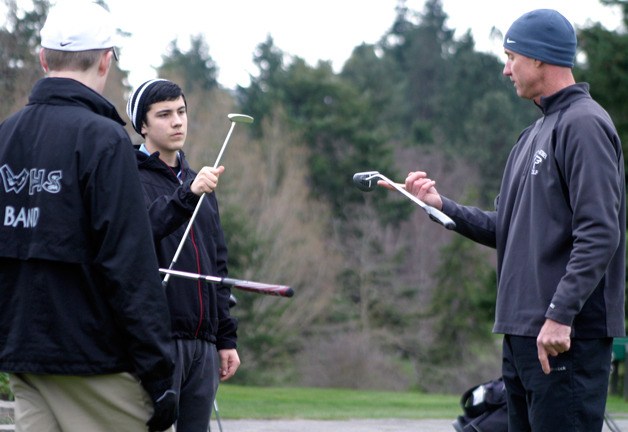 Steve Jones shows his Falcon golfers