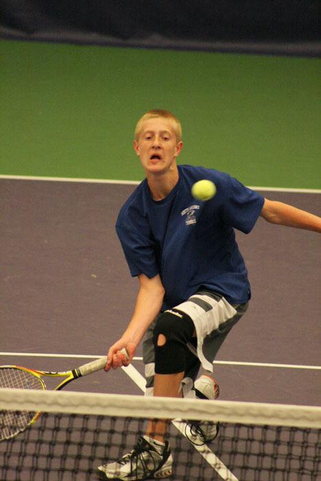 South Whidbey’s Riley Newman rushes to the net to return the ball in the 2A championship final against Will Topp.