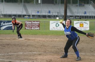 South Whidbey pitcher Katy Piehler hurls a curve ball Wednesday as her Lakewood counterpart prepares to steal third base.