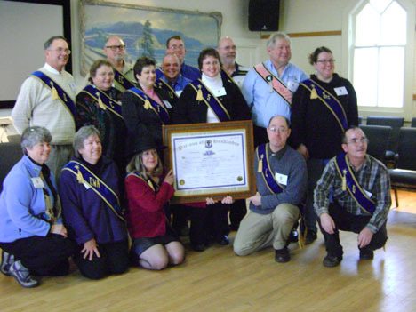 The charter members of Penn Cove Grange No. 1149 gather for a photo after the grange received its charter on Jan. 23. Pictured in front are Sarah Richards