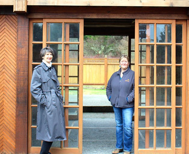 Broker Marchele Hatchner and Ryan’s House for Youth Executive Director Lori Cavender stand in the courtyard of the former Countryside Inn. Ryan’s House is hoping to purchase the motel in order to convert it to a temporary living facility and drop-in center for homeless youth