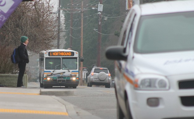 The Route 1 northbound bus approaches a stop in Freeland near Harbor Avenue. Midday runs may change.