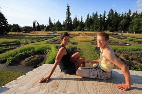 Gardeners Camille LaTray and Amy Johnson take the fruits of their labor at The Raven &The Spade in Freeland.
