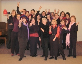 Some members of the local “The Vagina Monologues” production take a smile break during rehearsal. Front row: Joy Williams