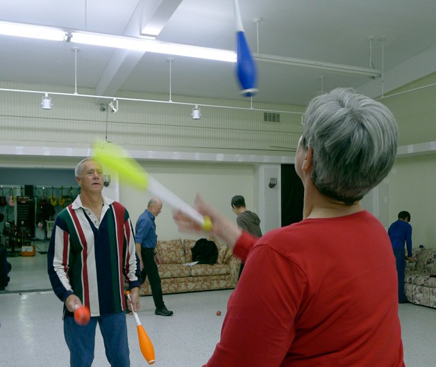 Dave Thompson juggles Wednesday night at Click Music. He is a member of the Whidbey Island Jugglers