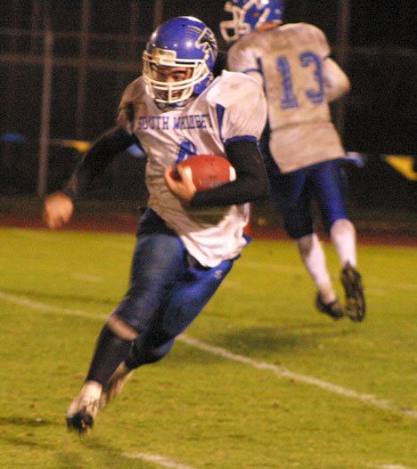 Falcon running back Henry Mead finds some all-too-rare breathing space during the Falcons’ 45-0 loss to  Burlington-Edison High School on Friday night as District 1 playoff games began. Mead ended the year with 1