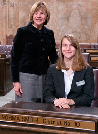 Rep. Norma Smith greets page Kristen Schuster.