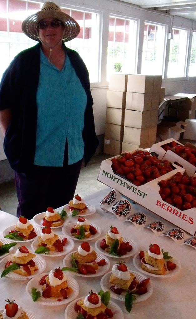 Dorothy Mueller presents fresh strawberry shortcake at last year's Slow Food Whidbey Island event.