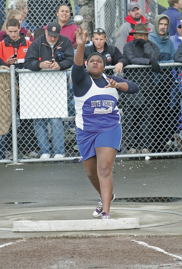 South Whidbey High School sophomore Angelina Berger puts the shot at the WIAA 2A track and field championships at Mount Tahoma High School. Berger won fourth place.