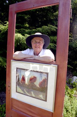 Pat Brookes shows one of her creations.