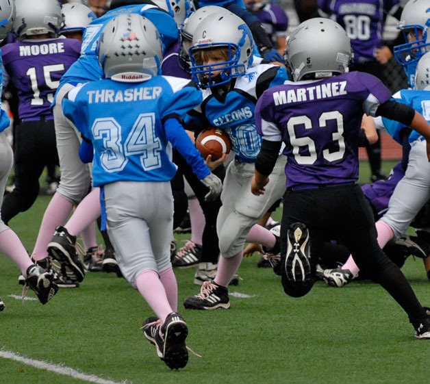 JJ Germano runs through the line against Anacortes.