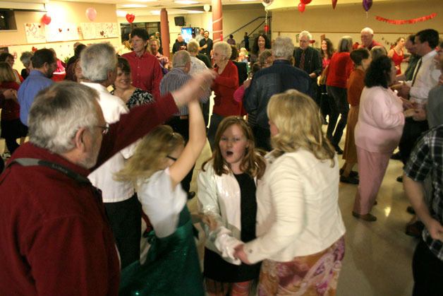 Dancers turn their partners during a song at the annual Sweetheart Big Band Dance last year. About 150 people attended the annual Sweetheart Big Band Dance in 2013