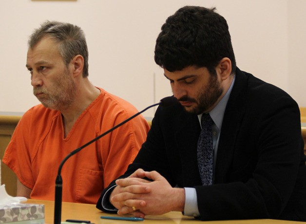 David De Spain sits in Island County court Jan. 30 with attorney Andrew Rice.