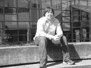 Wyatt Jarvis relaxes in the courtyard at South Whidbey High School. If he can raise the money