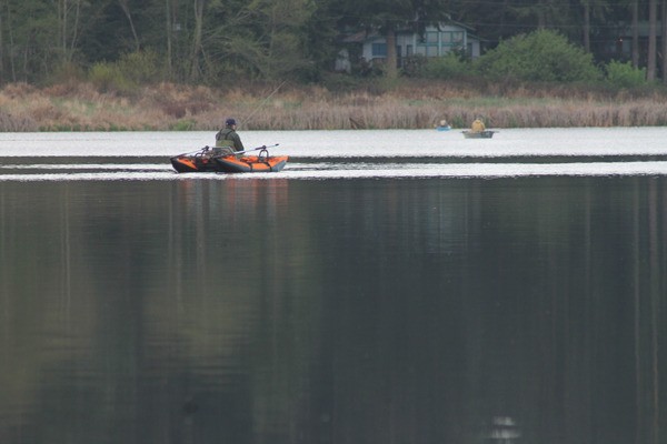 Anglers using selective gear try their hands at Lone Lake in Bayview during the season’s opening month in 2014. Trout have been planted at lakes across Whidbey.