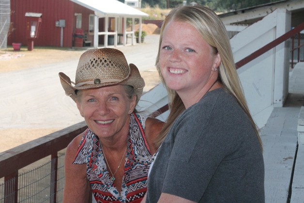 Carol Coble and Kiley Grant take a stop during a recent short tour of the Island County Fairgrounds. They have known each other for years. As interim co-fair administrators