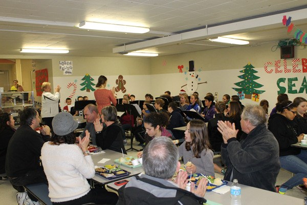 Langley Middle School students enjoy lunch with parents and guardians.