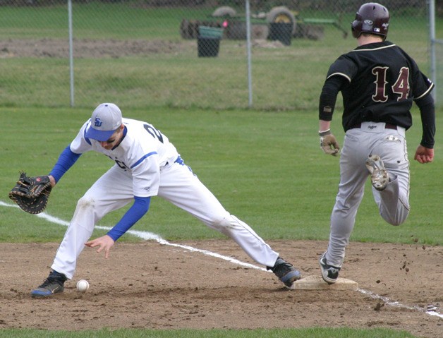Falcon first baseman CJ Sutfin loses the ball after it one-hopped into his glove from third baseman Jack Lewis. The Cougars scored a run on the error in the fourth inning.