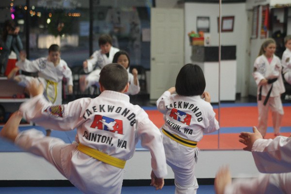 Students practice drills at Armstrong’s Taekwondo class on Thursday afternoon.