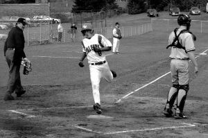 Robert Kirby crosses home plate Monday as South Whidbey trounced Granite Falls 7-3 in the first-of-three series at Falcon Field. His double into the left field in the first inning sparked the Falcon batters.