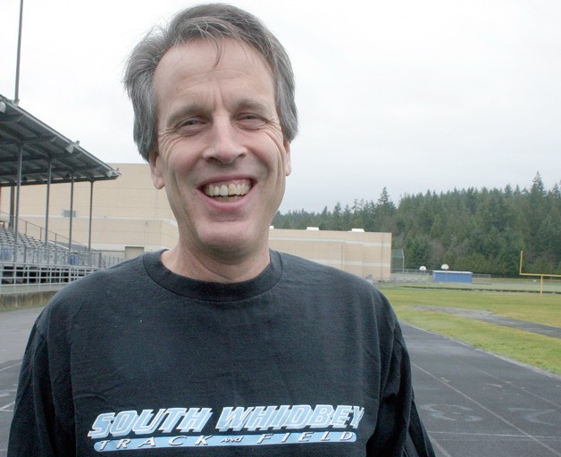 Doug Fulton hits the track for one of his several weekly runs after school. After 13 years leading the track and field team at South Whidbey High School
