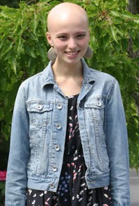 Lennox Bishop takes in a beautiful day outside her church