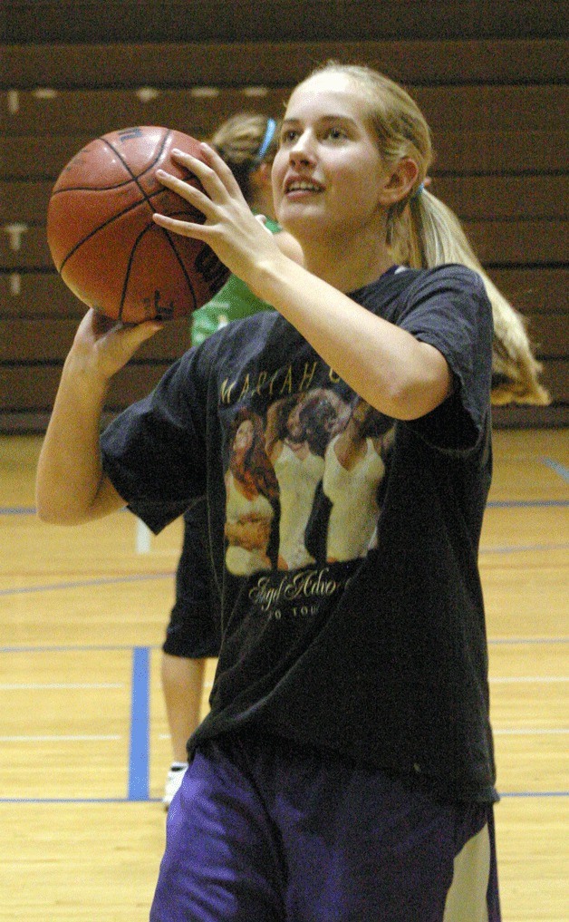 Hayley Newman puts up a shot during warmup drills. The drills paid off for her in the first game of the season