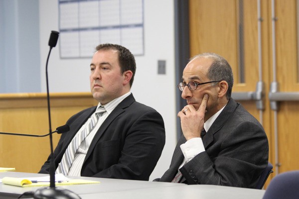 Island County Prosecutor Greg Banks (right)