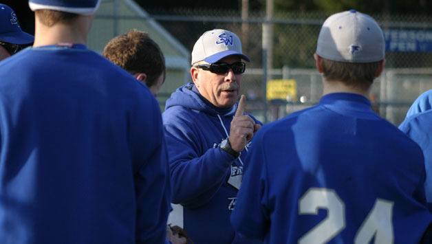 Falcon head baseball coach Dave Guetlin motivates his team during practice. Guetlin said a lot of effort and dedication is required to make the district playoffs this season. His team has only four seniors