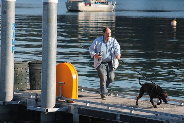 Neil Colburn walks his dog