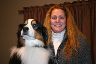 Laurie Thompson at home with Tucker in Clinton. “He’s just another member of the family.”