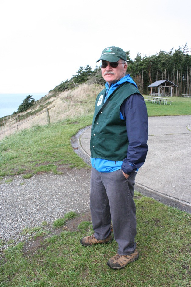 Washington State Parks volunteer Larry Doles explains his role as a trail monitor at Fort Ebey. Doles said in four years volunteering for the park system