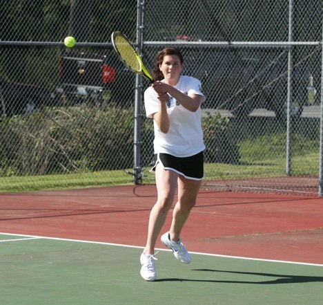 Falcon sophomore Jessica Cary returns a serve Wednesday during her winning match against Sedro-Woolley.
