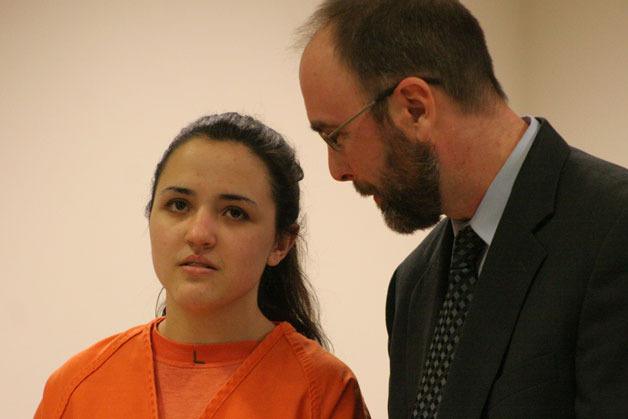 Kaylea F. Souza listens to her attorney