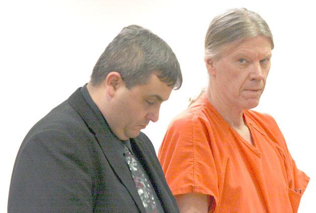 Suspected murderer James Huden appears in court Monday with his attorney